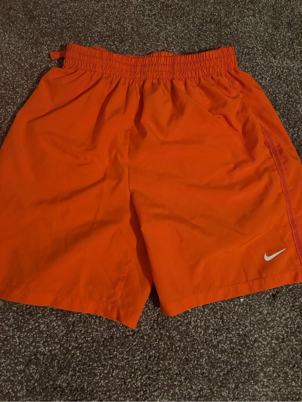Nike kids Bright Orange Athletic Shorts with White Swoosh